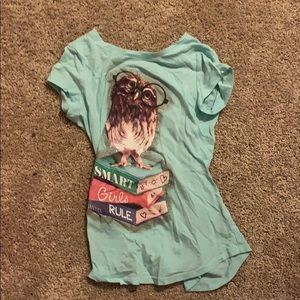 Geeky Owl standing on books